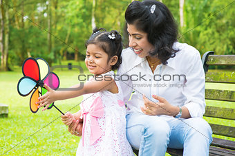  mother and daughter playing windmill