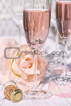 Ring in pink champagne with flowers