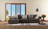 Modern living room with brown sofa