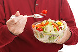 Senior Man Eats Salad - Closeup