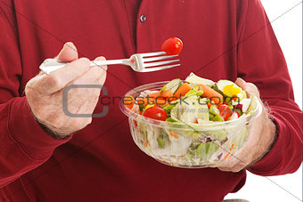 Senior Man Eats Salad - Closeup