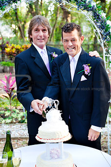 Two Grooms Cutting Cake at Their Wedding