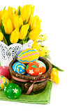 easter eggs with spring flowers