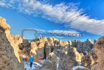 hiker in Natural Fort rock formation