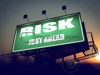 Risk Just Ahead on Green Billboard.