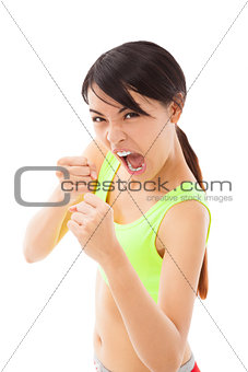 young woman screaming  fighting  workout fitness