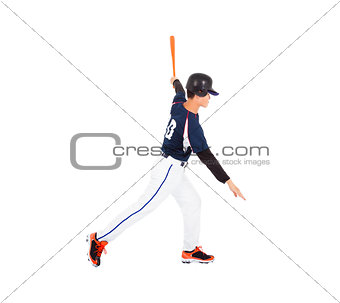 Baseball player hitting ball  with bat on the side. 
