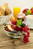 tasty breakfast with flakes and fruits in morning