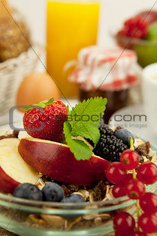 tasty breakfast with flakes and fruits in morning