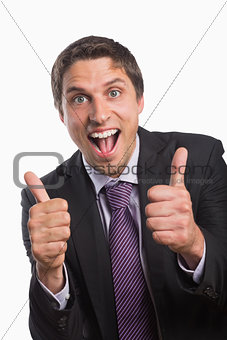 Cheerful businessman gesturing thumbs up