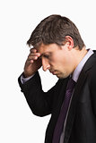 Close-up side view of a worried businessman