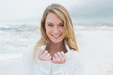Portrait of a smiling casual young woman at beach
