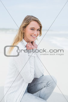 Portrait of a smiling casual woman relaxing at beach