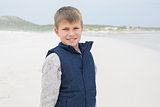 Portrait of a cute smiling boy at beach