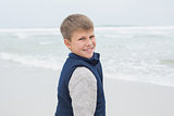 Portrait of a cute smiling boy at beach