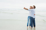 Young couple dancing at beach