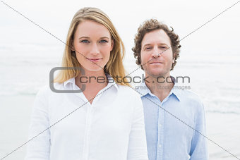 Portrait of a smiling casual couple at beach