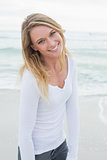 Portrait of a smiling casual woman at beach