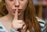 Redhead student asking for silence