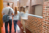 Students walking in the hall together