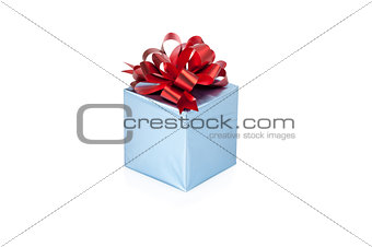 Blue gift box with red ribbon isolated on white background