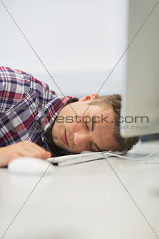Student sleeping in the computer room