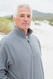 Portrait of a casual senior man at beach