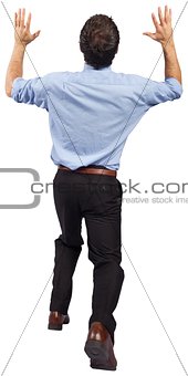 Businessman posing with arms up