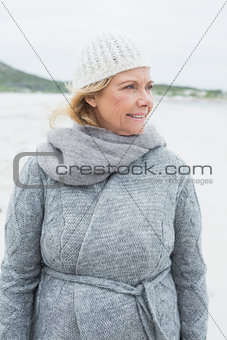 Senior woman looking away at beach