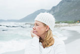 Close-up of contemplative senior woman at beach