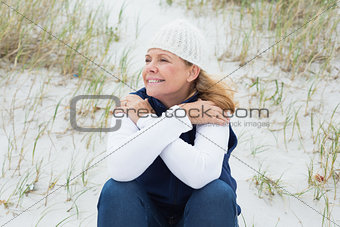 Senior woman looking away at beach