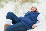 Relaxed contemplative senior woman at beach