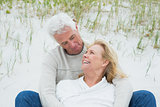 Romantic senior couple relaxing at beach