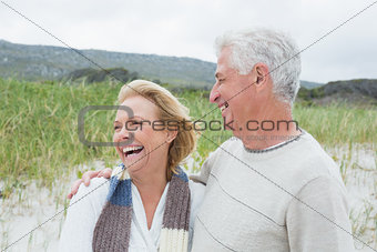 Cheerful senior couple at beach
