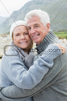 Portrait of a romantic senior couple hugging