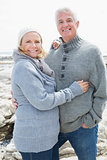 Romantic senior couple on rocky beach
