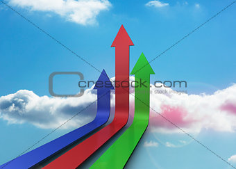 Colourful arrows pointing up against sky