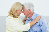 Romantic relaxed senior couple at home