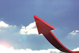 Red curved arrow pointing up against sky