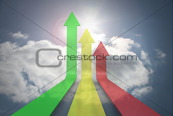 Colorful arrows pointing up against sky