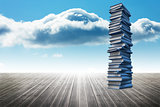 Stack of books against sky