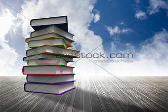 Stack of books against sky