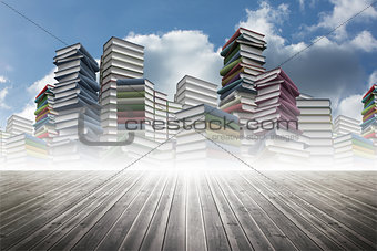 Piles of books against sky
