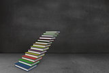 Steps made from books in grey room