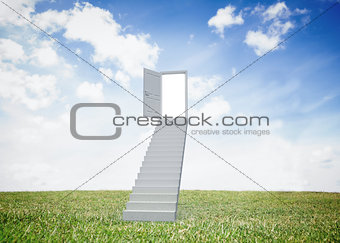 Open door at top of stairs in a field