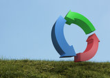 Blue red and green arrows in a field