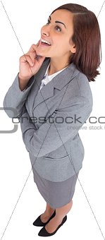 Smiling thoughtful businesswoman