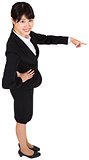 Smiling businesswoman pointing
