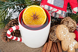 Christmas mulled wine with fir tree, gingerbread and decor