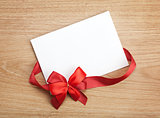 Valentine's day blank gift card and red ribbon with bow
